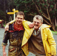 Picture of William and Alastair, muddy but happy after a day on the stupa site